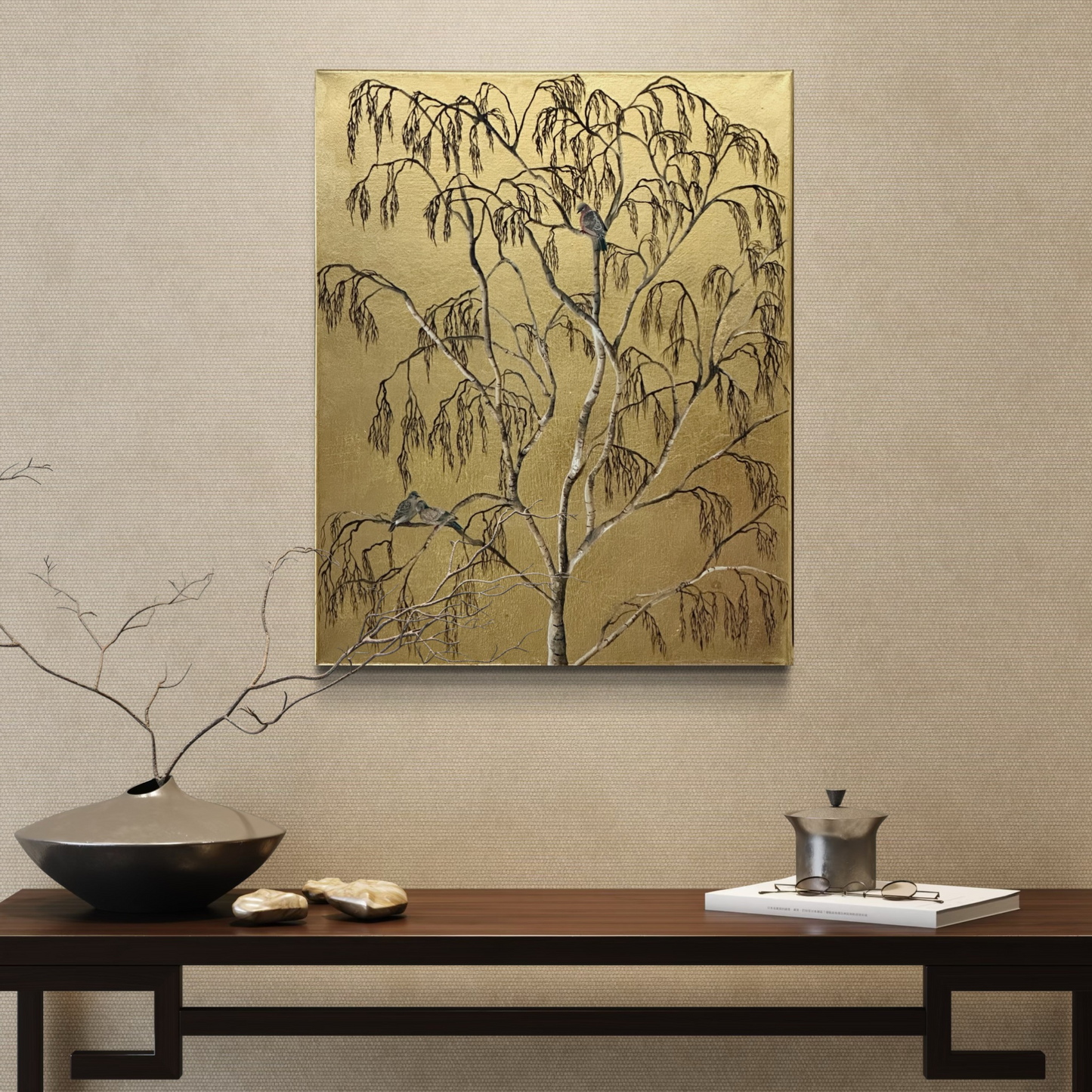 gold leaf painting of stock dovers perched in a silver birch tree, displayed in a minimalist interior with neutral tones and a dark wood console table