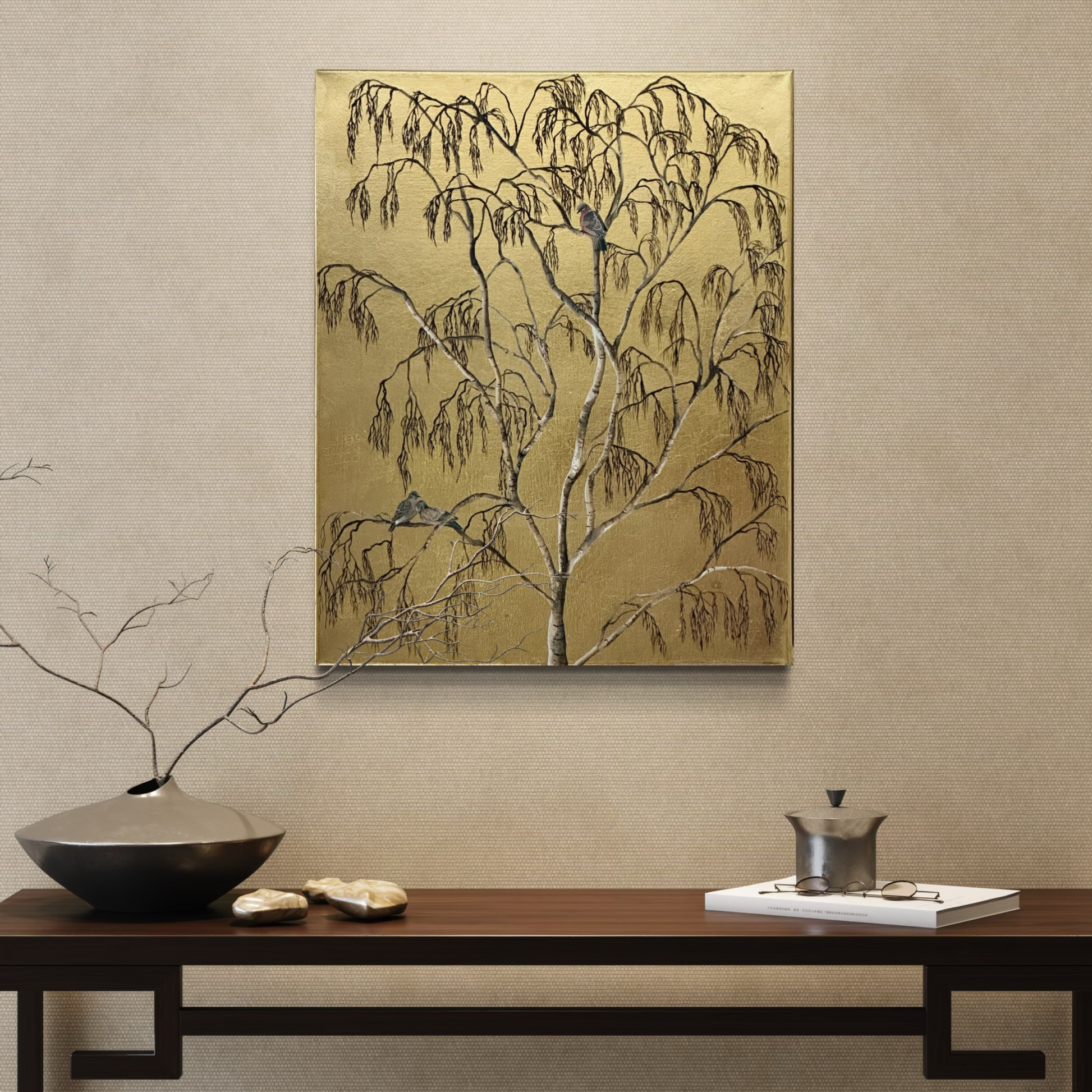 gold leaf painting of stock dovers perched in a silver birch tree, displayed in a minimalist interior with neutral tones and a dark wood console table 
